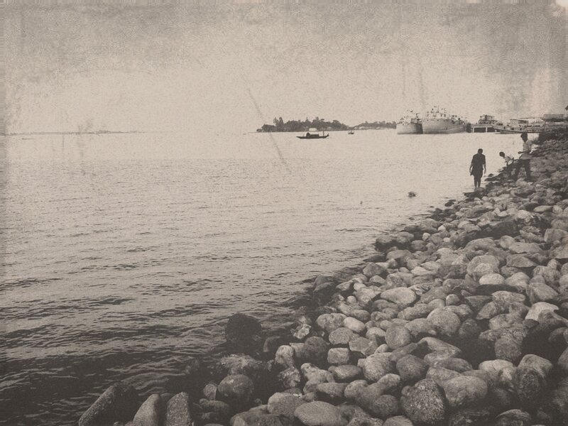 People on Rocky Shore — Black