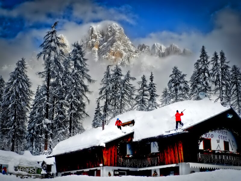 People on Snow-covered Roof