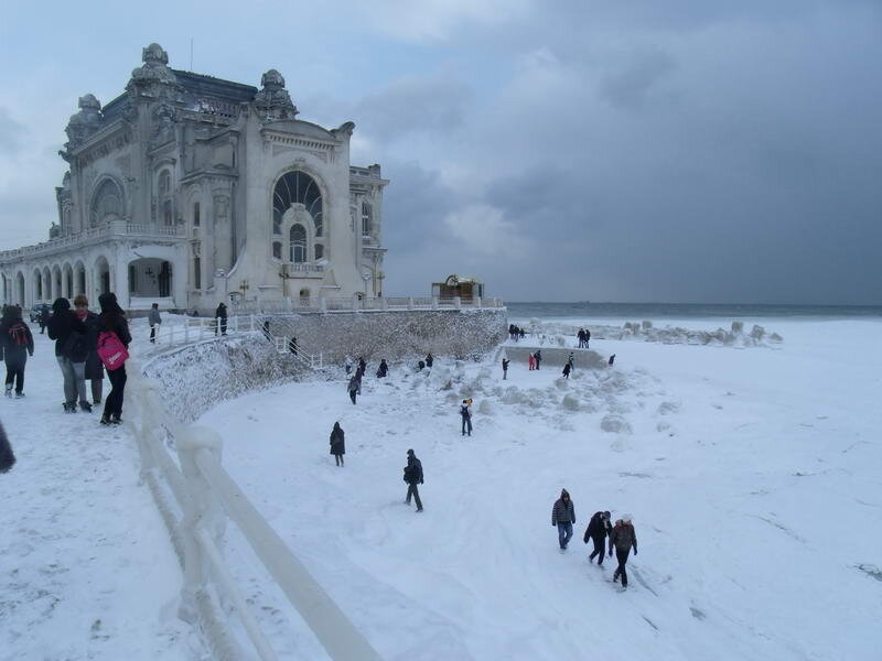 People on Snowy Beach