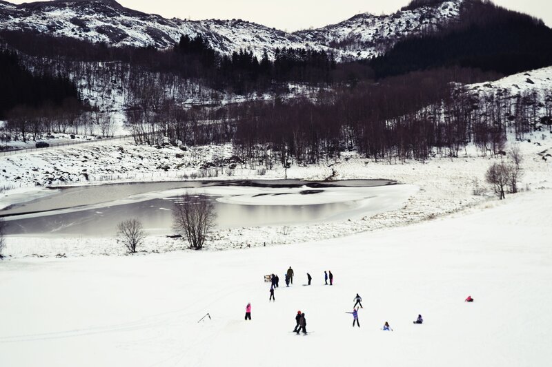 People on Snowy Hill — White