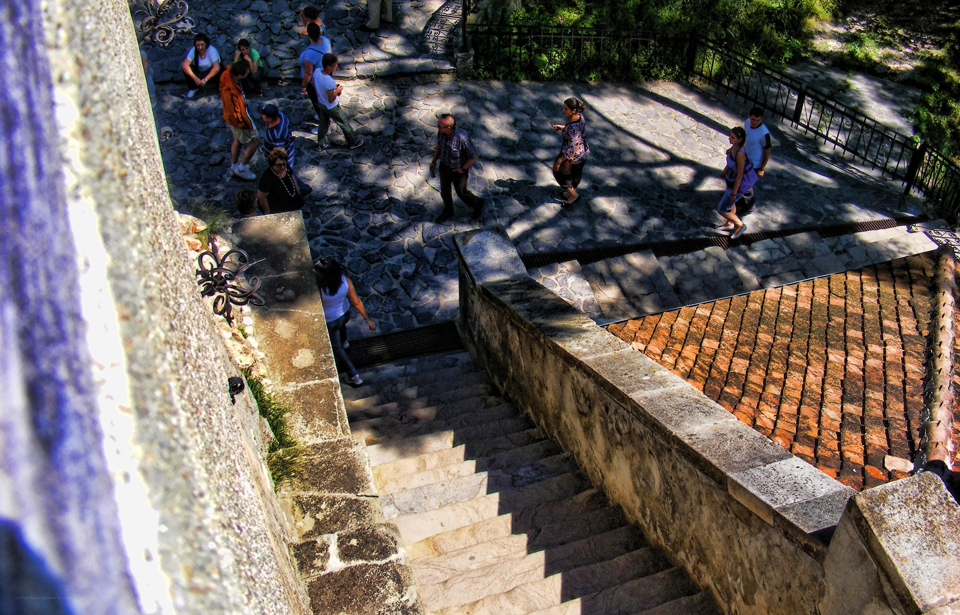People on stone steps and walkway