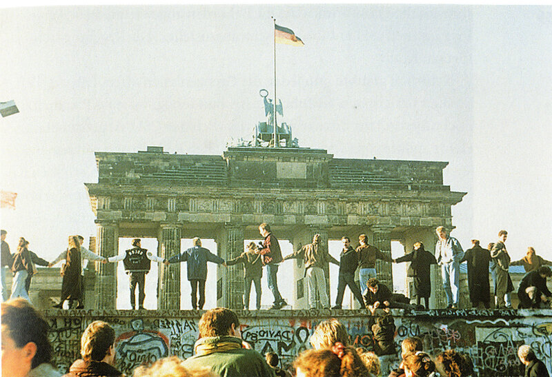 People on the Berlin Wall