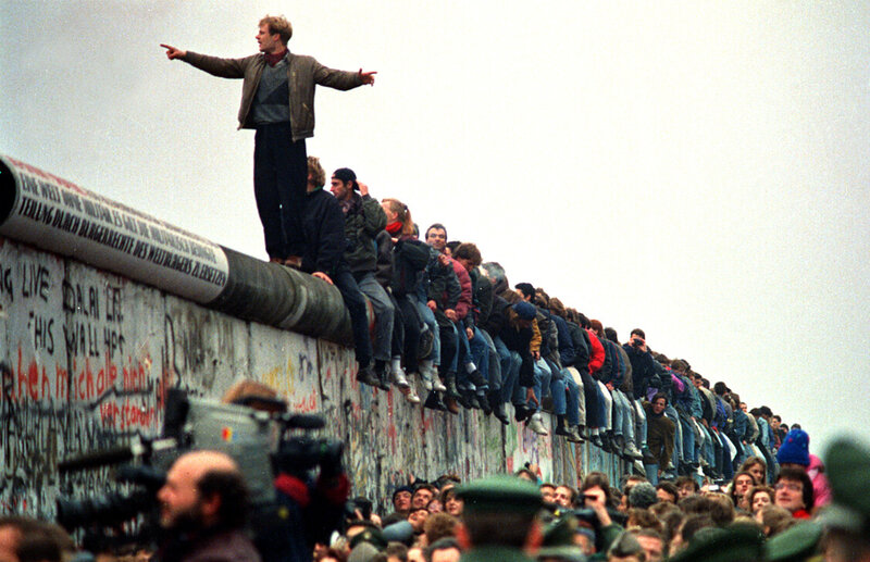 People on the Berlin Wall