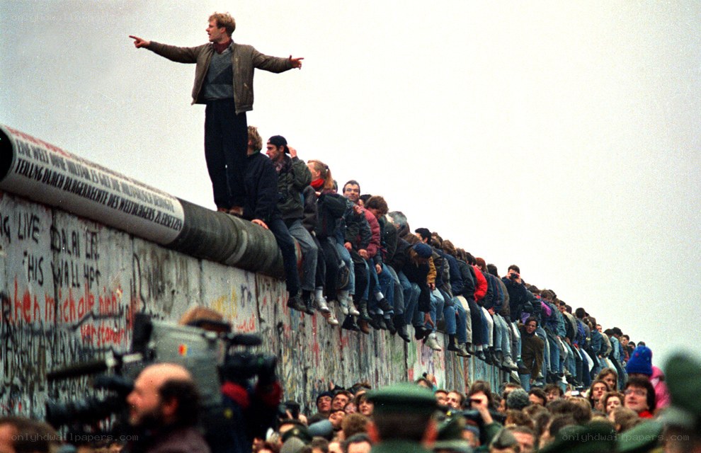 People on the Berlin Wall