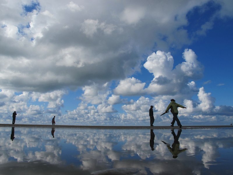 People on Wet Beach