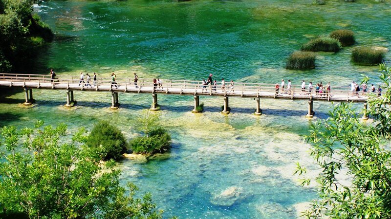 People on Wooden Bridge