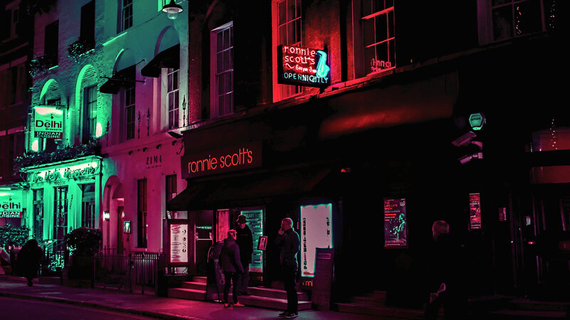 People Outside a Bar