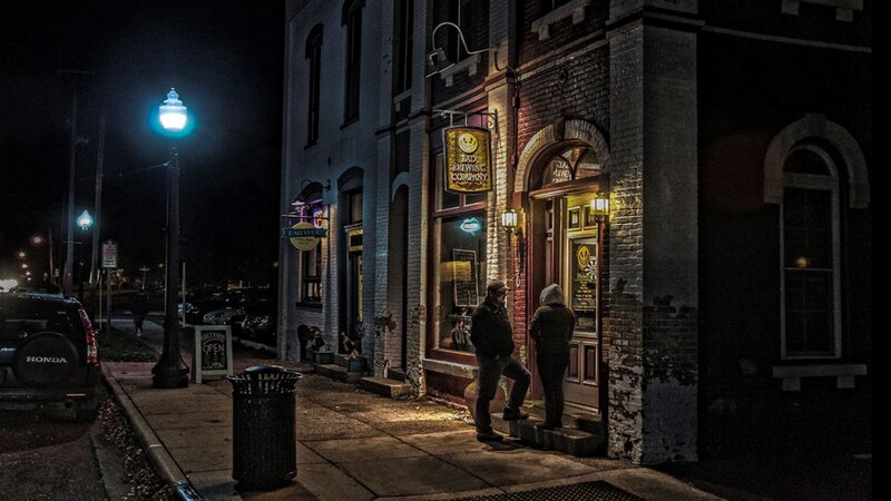 People Outside Bar at Night