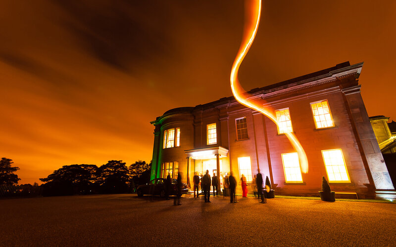 People Outside Building at Night