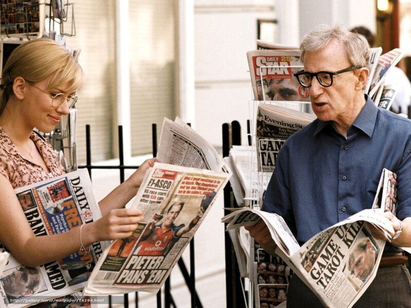 People reading newspapers