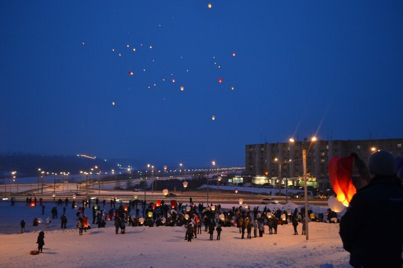People Releasing Lanterns — Blue, Festive