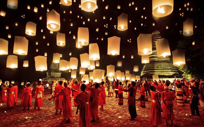 People Releasing Lanterns — Red