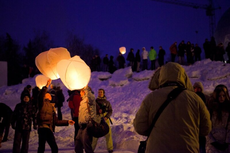 People Releasing Sky Lanterns — Blue