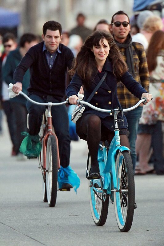 People riding bicycles on street