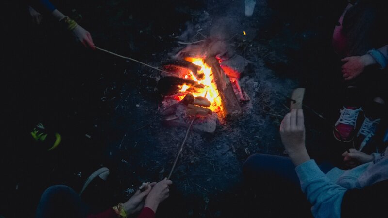 People Roasting Marshmallows