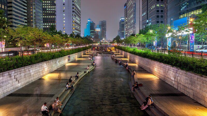 People Sitting in Canal