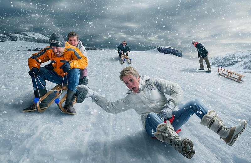 People Sledding in Snow — White