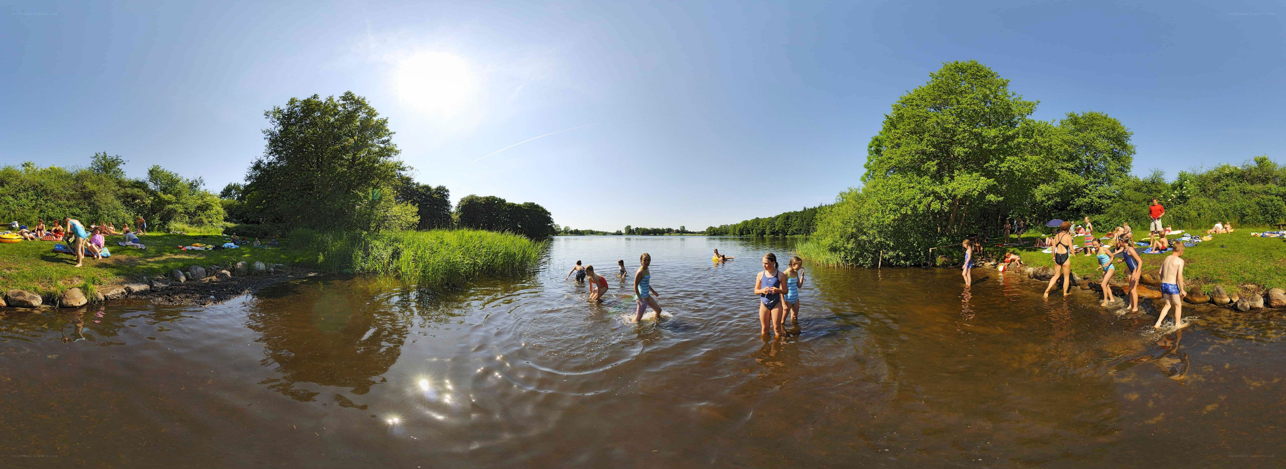 People swimming at a lake