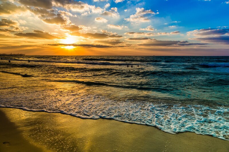 People Swimming at Sunset — Blue