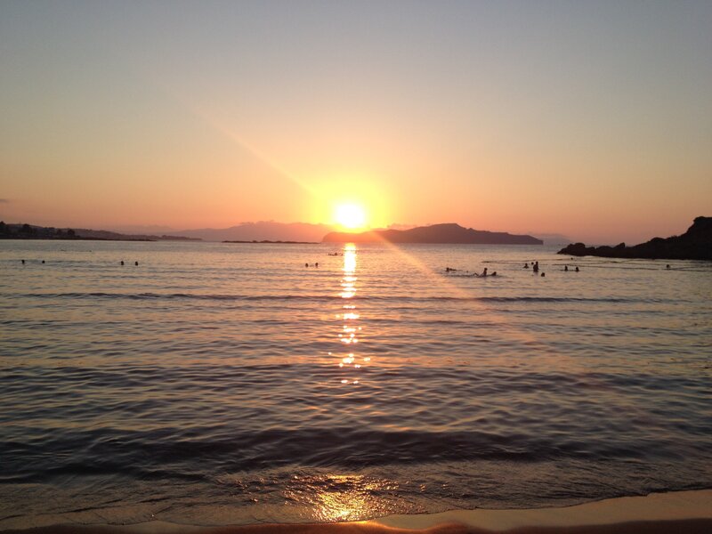 People Swimming at Sunset — Orange, Serene