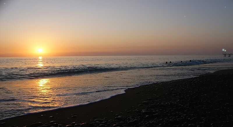 People Swimming at Sunset — Orange