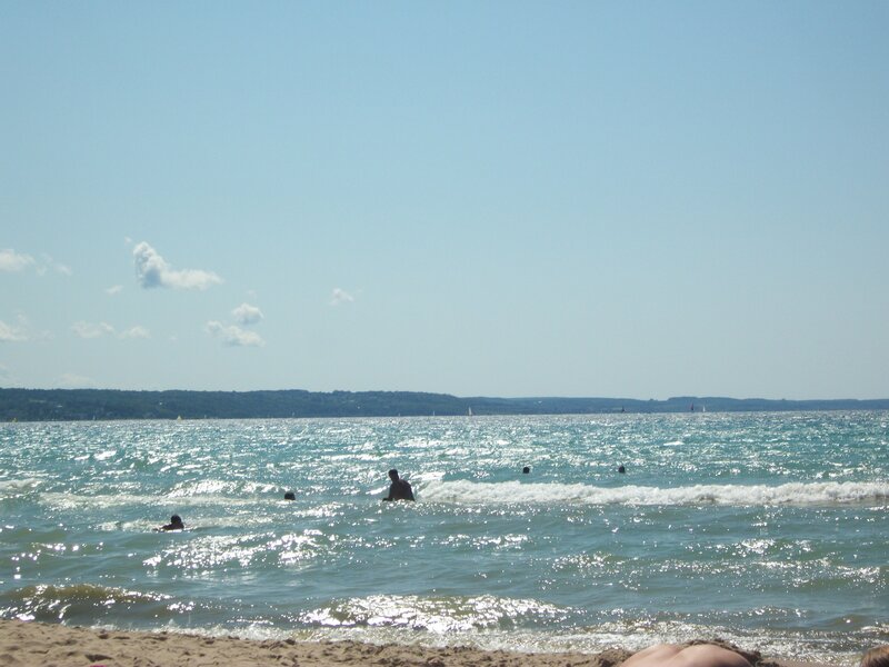 People Swimming in Ocean — Blue