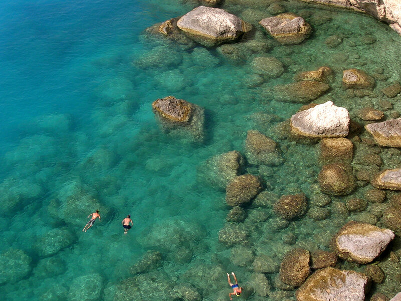 People Swimming in Sea