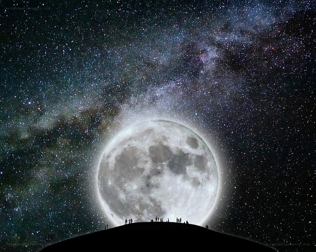 People under a full moon