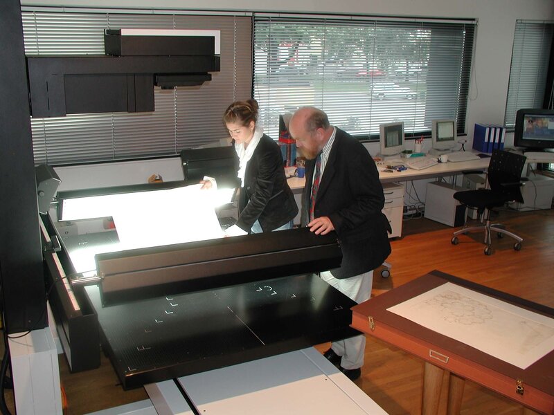 People using a large scanner