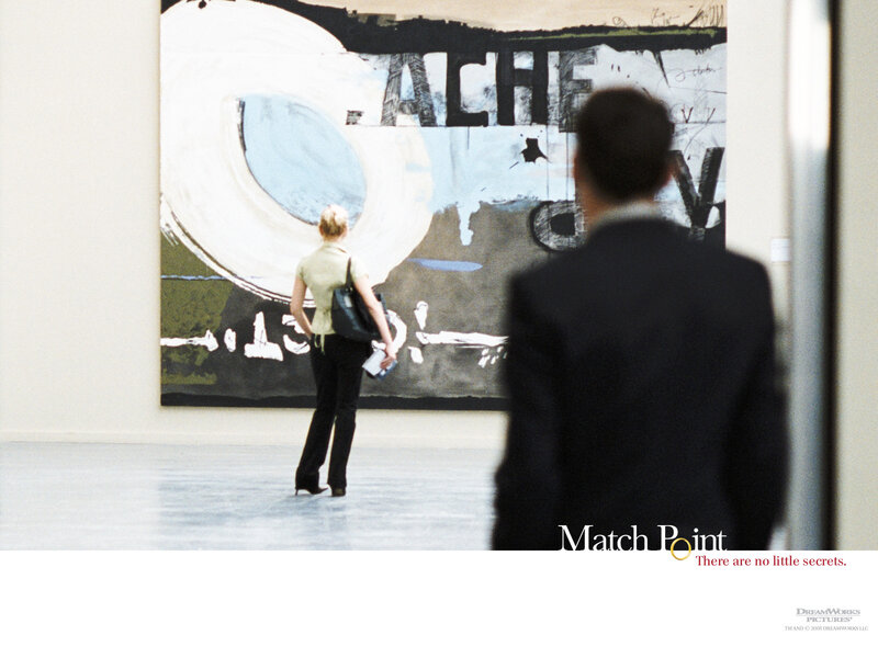 People viewing art in gallery