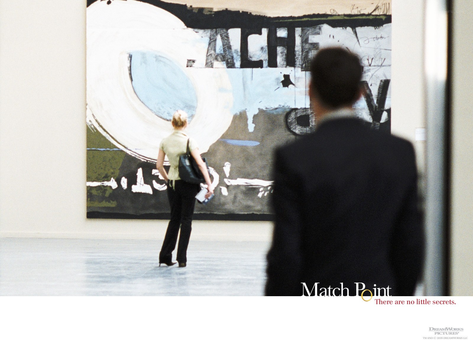 People viewing art in gallery