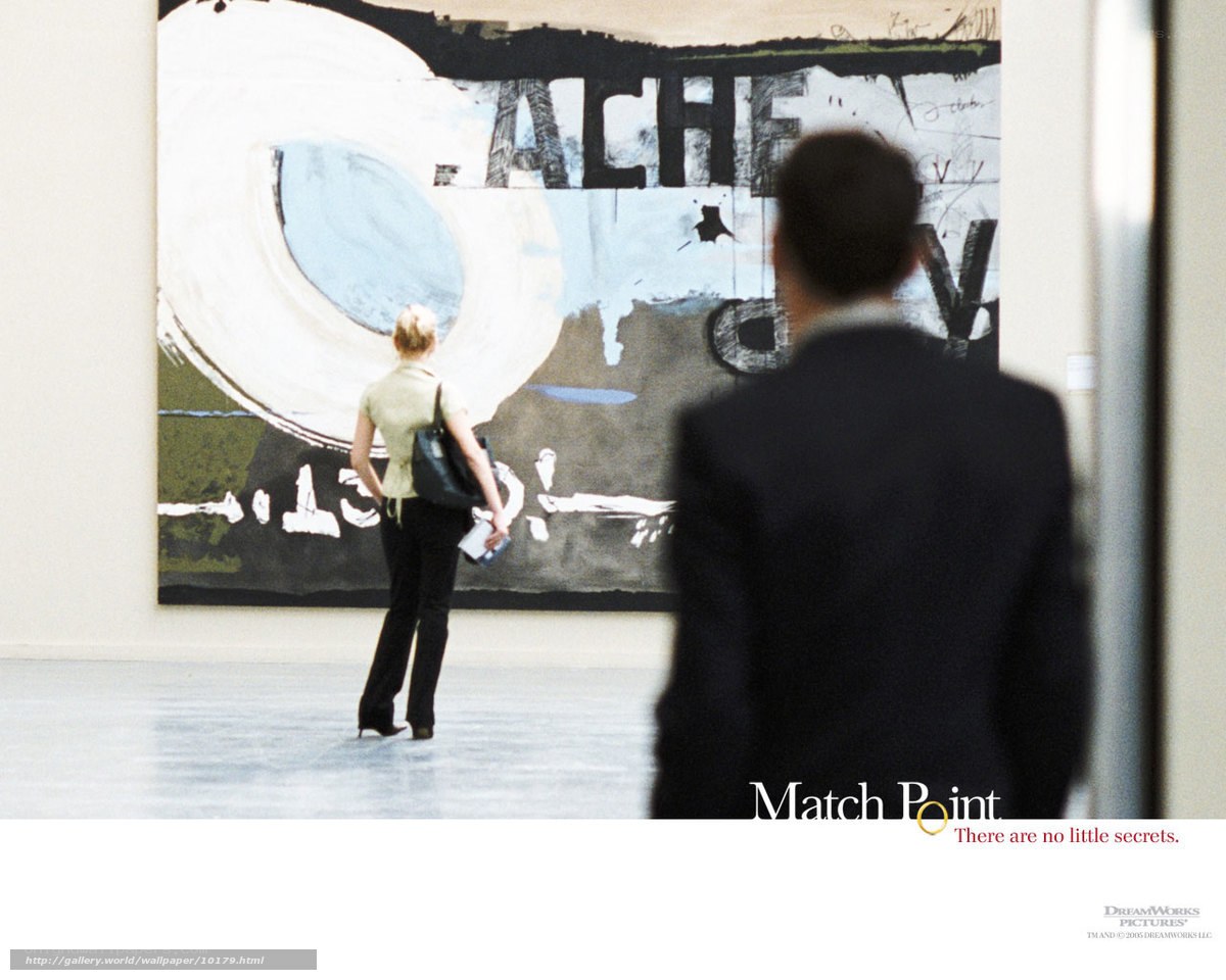 People viewing art in gallery
