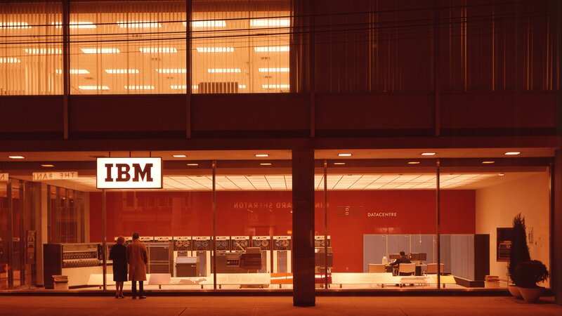 People Viewing IBM Display — Red