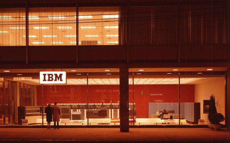 People Viewing IBM Display