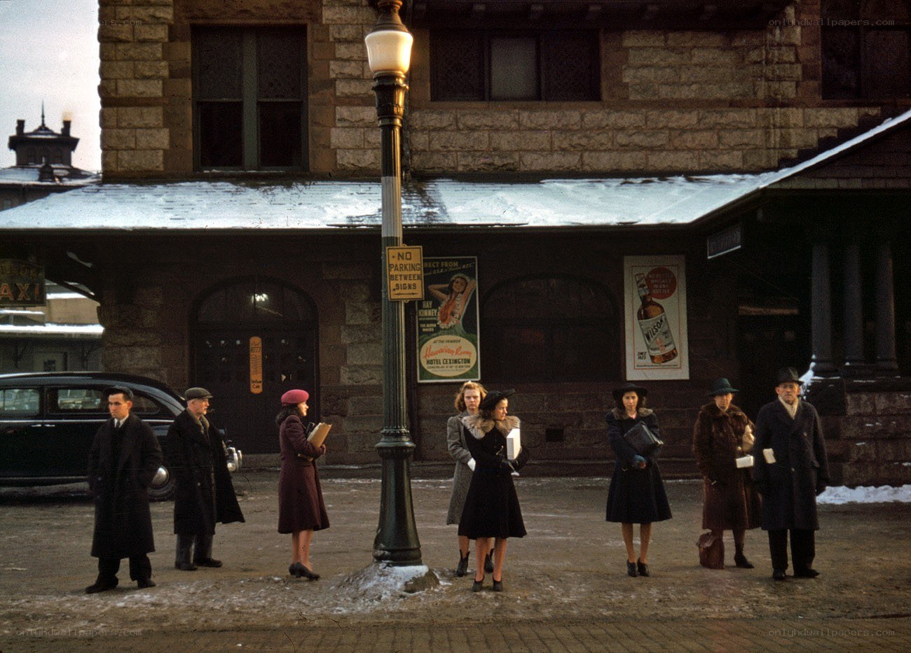 People waiting at a train station