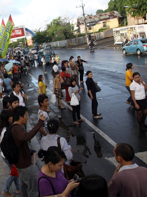 People Waiting at Crosswalk — Gray