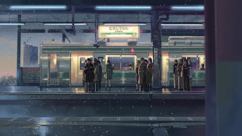 People Waiting at Train Station