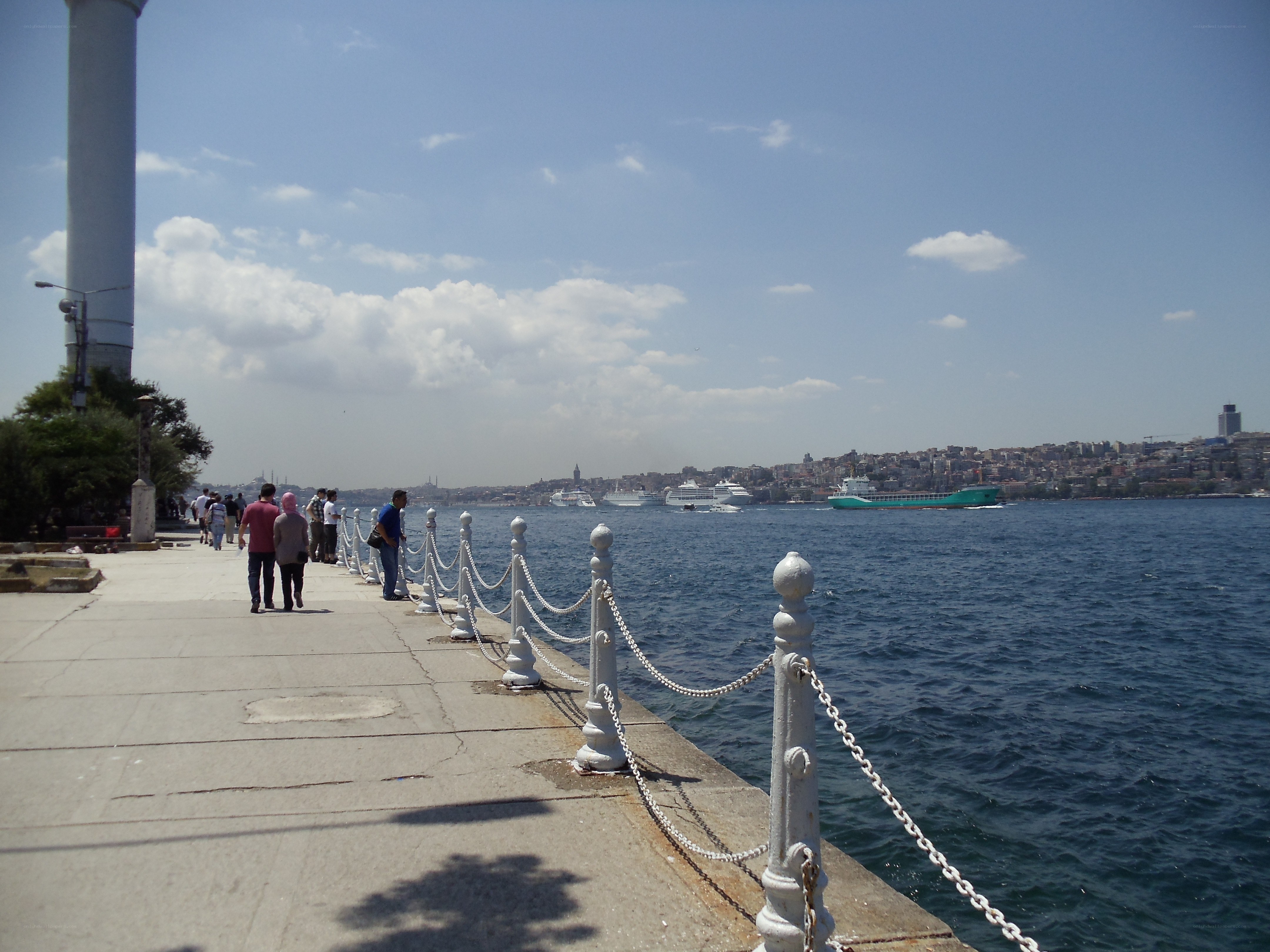 People walking by the waterfront