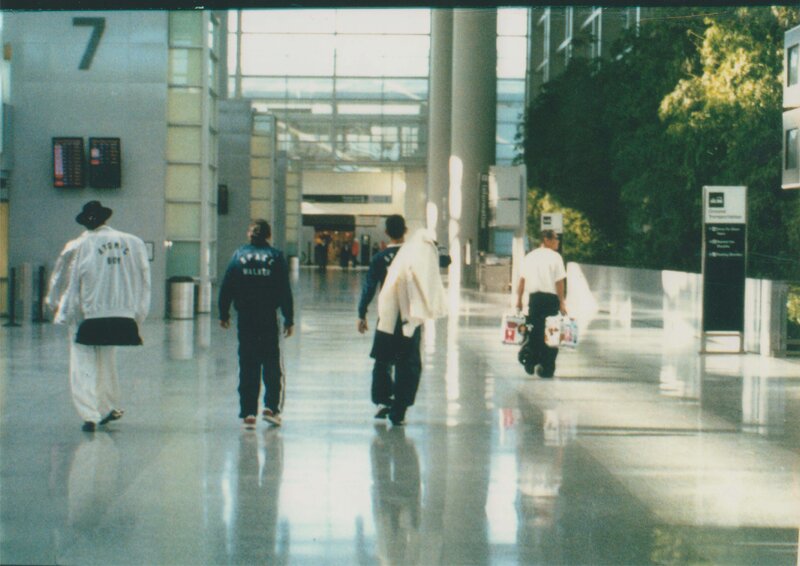 People walking in airport terminal