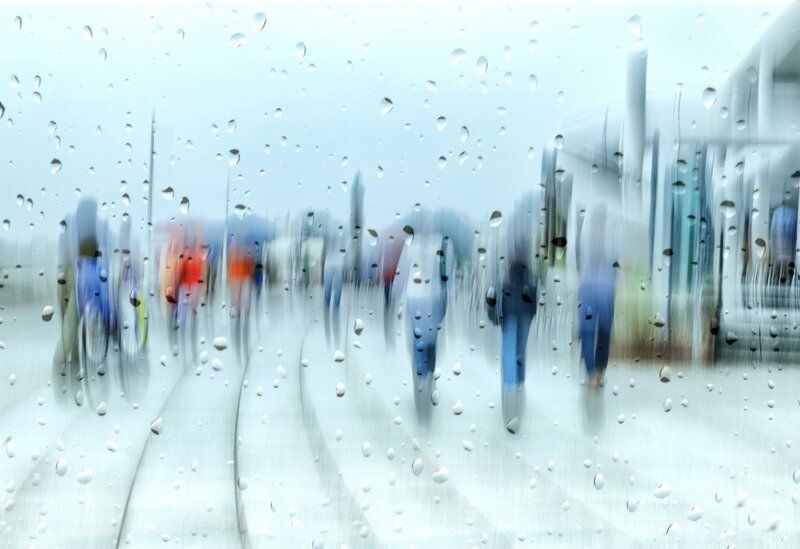 People Walking in Rain — White, Blurry