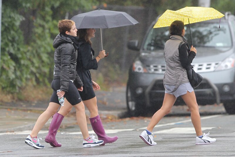 People walking in the rain