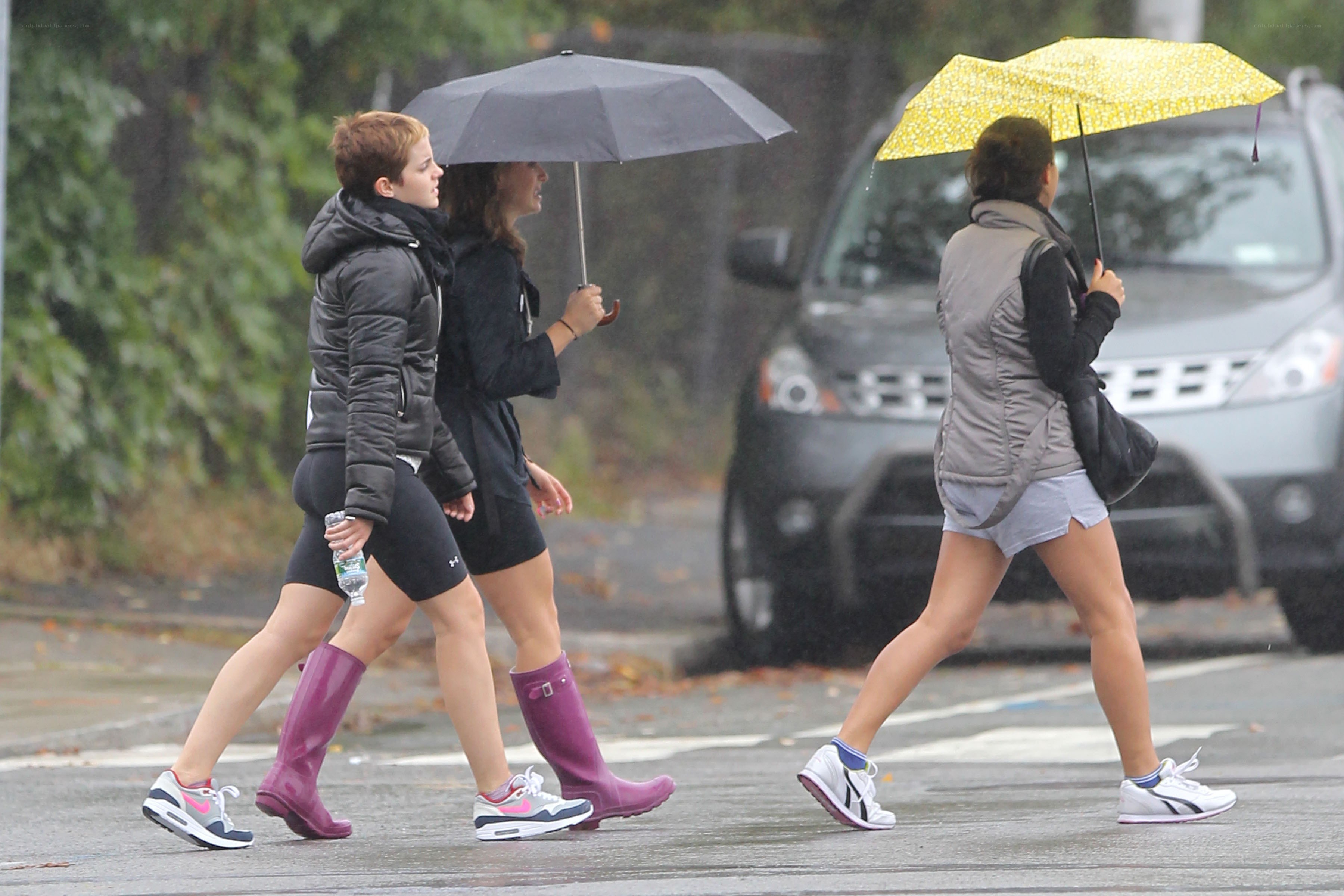 People walking in the rain