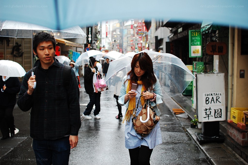 People walking in the rain
