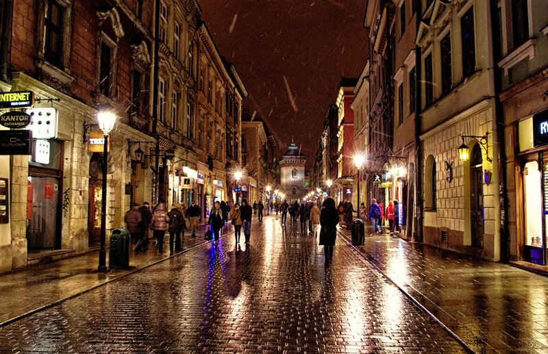 People Walking on Cobblestone Street — Yellow