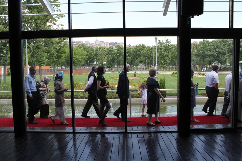People walking on red carpet