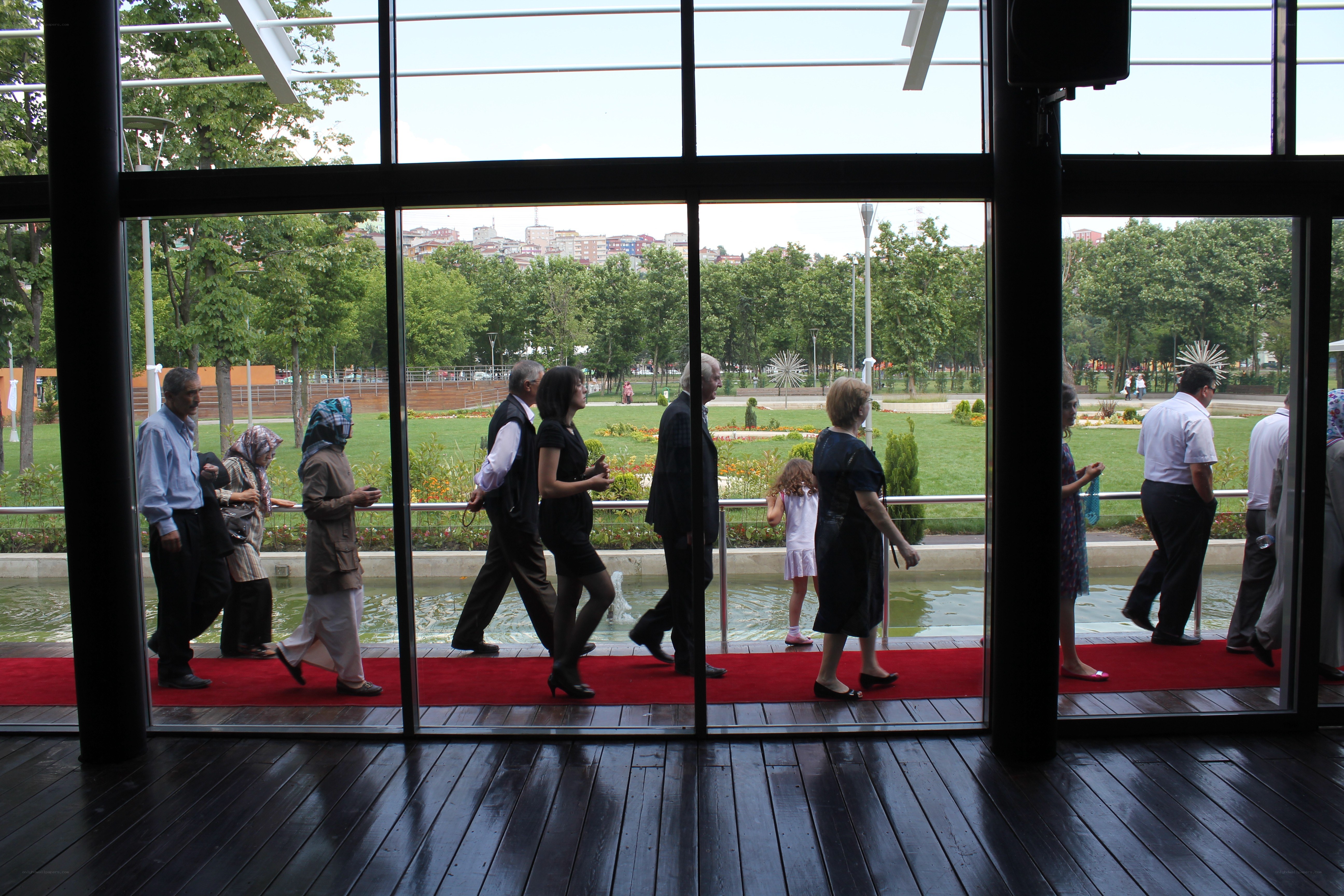 People walking on red carpet