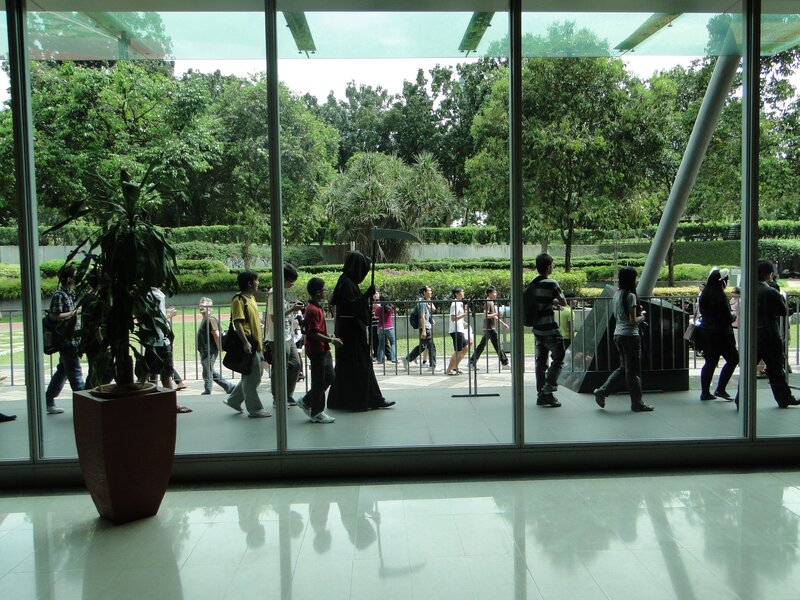 People walking outside a modern building