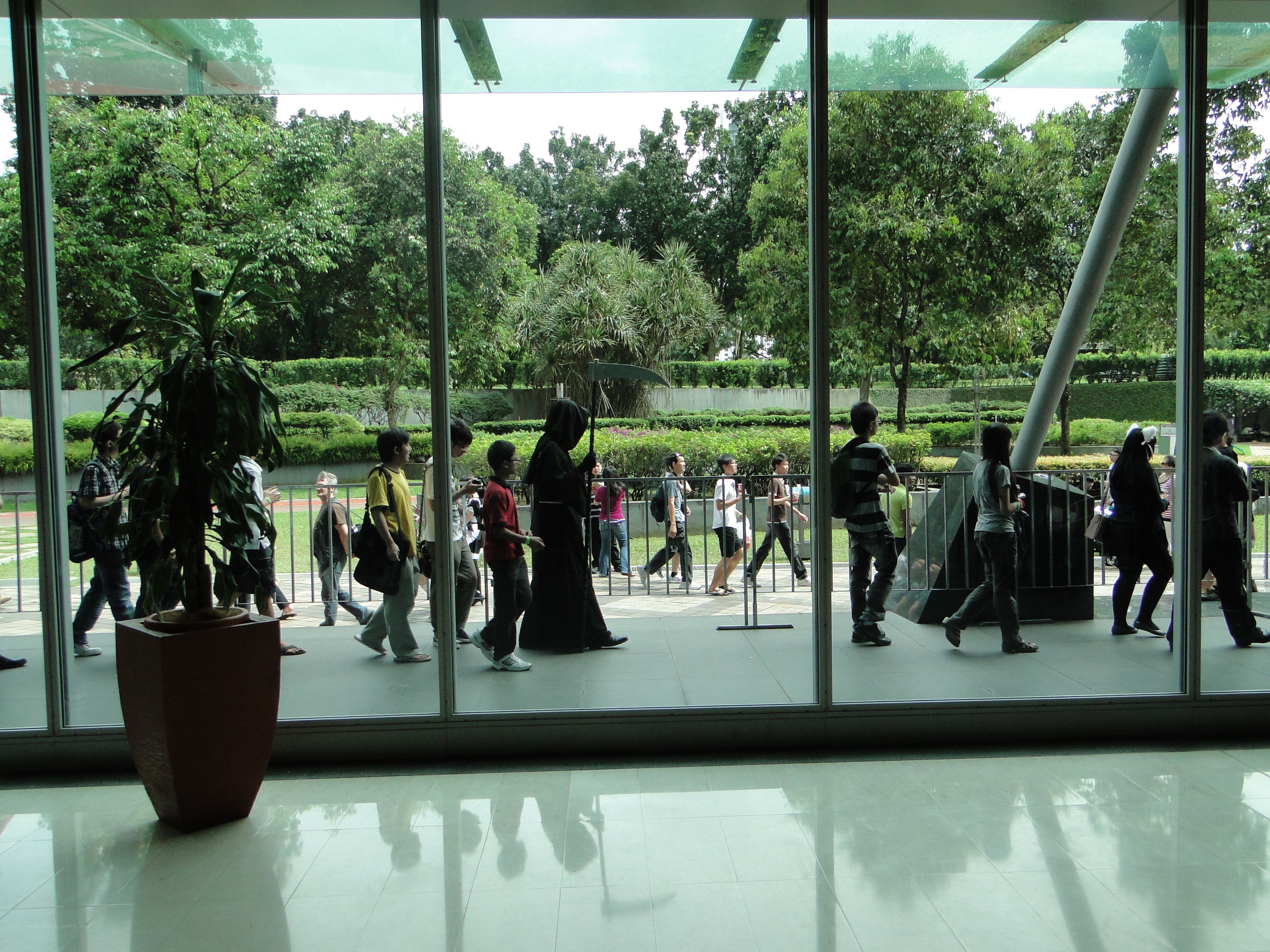 People walking outside a modern building