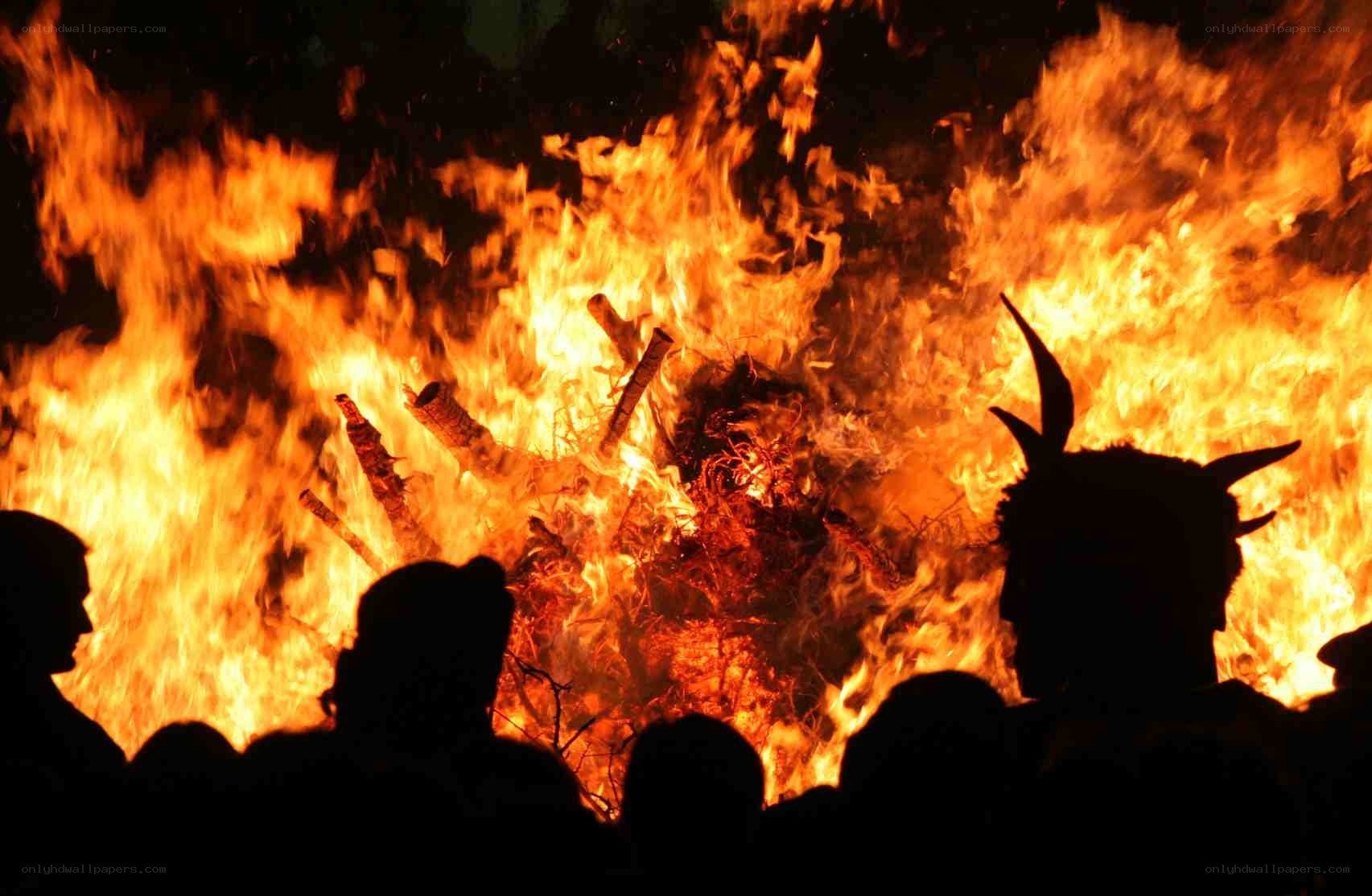 People watching a bonfire