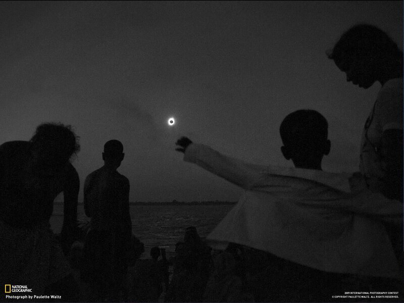 People watching a solar eclipse